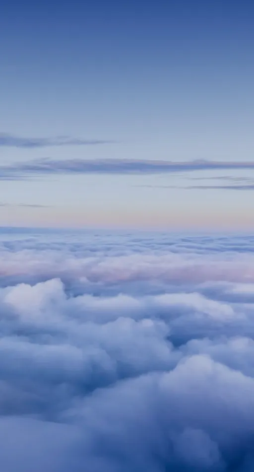 Denza brand motif: a sea of cloud above a horizon at dawn